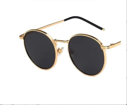 gold frame, dark glass